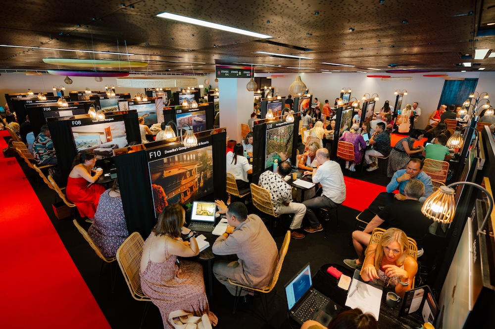 Stand design featuring destination visuals and brand assets at the marketplace