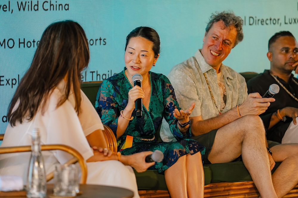 Panelists discussing APAC travel trends